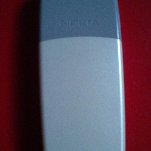 Nokia 2310 mobile phone with compatible battery