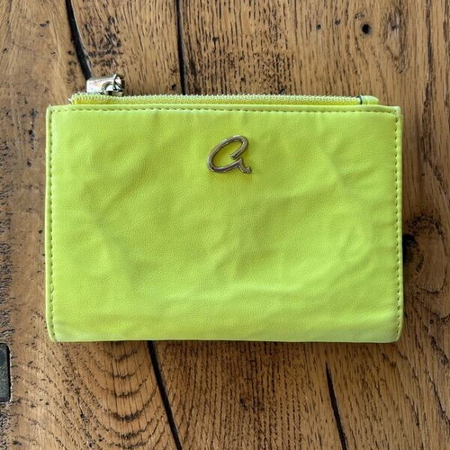 Axel wallet used in bright lime color