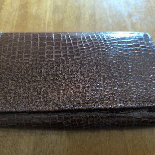 Long vintage brown leather wallet with crocodile pattern and metal corners