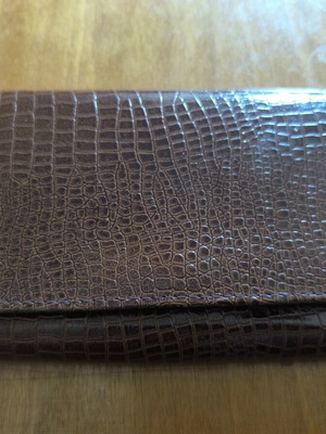 Long vintage brown leather wallet with crocodile pattern and metal corners
