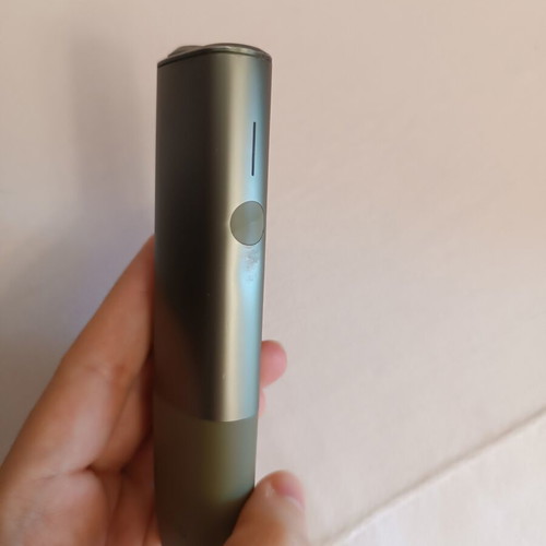 Iqos devices used, pack of two green with charger and brush
