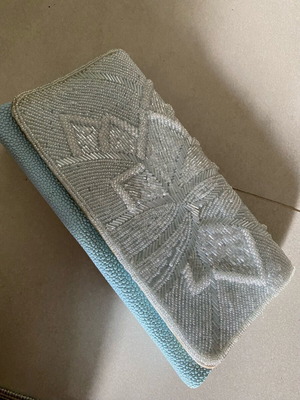 Vintage baby blue bag used with steel crossbody strap