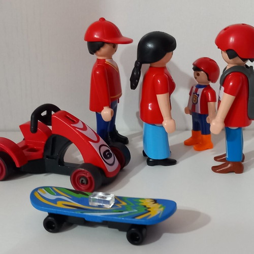 Playmobil family figures set used, 4 pieces with kart and skateboard
