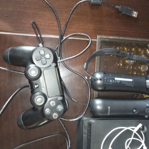 PlayStation 4 Console with VR like new, 1TB, 2 controllers, camera, 25 games