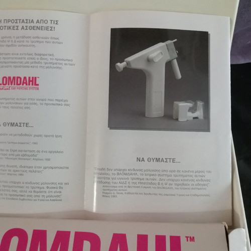 Ear piercing machine used with 2 replacement needles