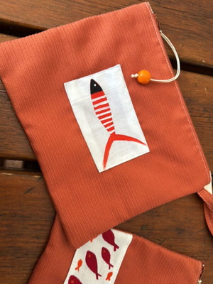 Fabric pouches set of 2 with fish design, brown-orange