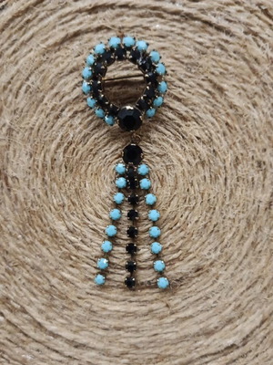 Vintage brooch with black and turquoise rhinestones like new
