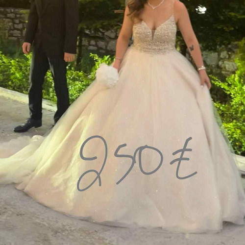 Cream wedding dress like new with stones and train