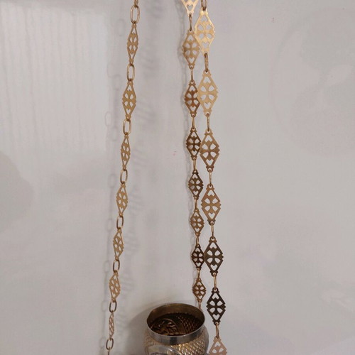 Bronze lamp used like new with beautiful designs and 70 cm chain