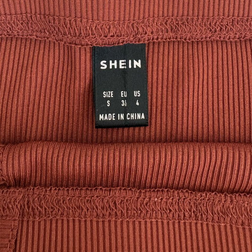 Shein red skirt, short with subtle front design