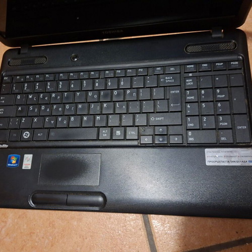 Toshiba laptop used, black, 13-inch, AMD E-Series, 2GB RAM, HDD, Windows