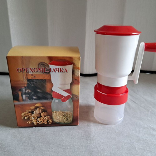Nut grinder new, manual grinder for nuts and spices, plastic