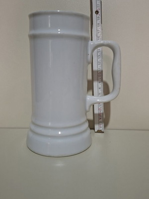 Large beer glass in traditional German design like new