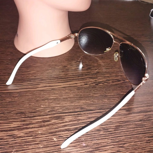 Women's sunglasses used, white with rose gold details