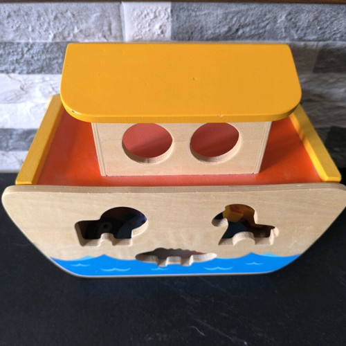 Wooden Noah's Ark toy like new with peg shapes