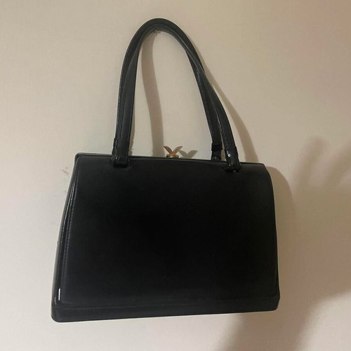 Vintage black patent leather handbag with gold wing clasp like new