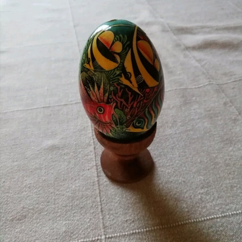 Painted egg used with wooden base