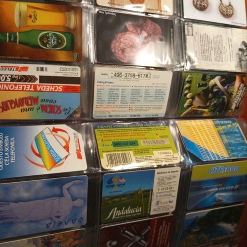 Phone card album like new, 75 cards from various countries and Greece