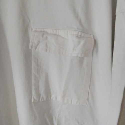 Oversized white T-shirt with front pocket, 100% cotton
