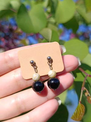 Handmade earrings new with steel clasps and yellow and black beads