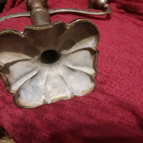 Metal triple candlestick used, ornate and heavy