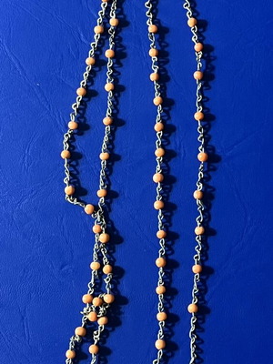 Necklace with orange beads on metal chain like new