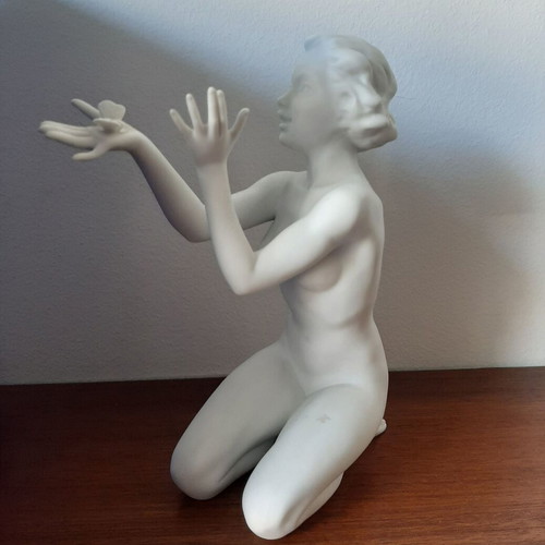 Kaiser porcelain figure woman with butterfly, like new