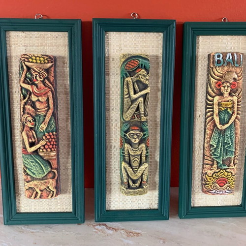 Handmade wooden frames with embossed exotic figures from Bali