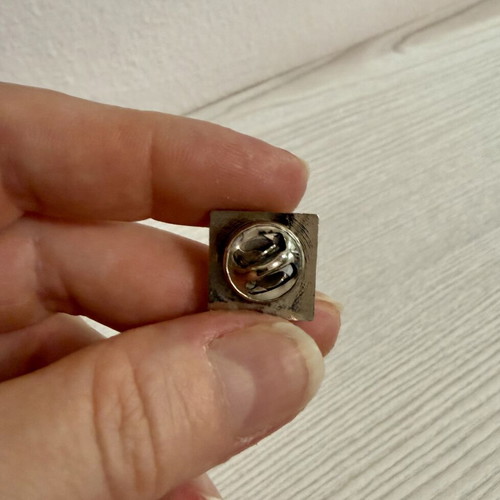 Commemorative pin for 10 years of Onassis Cardiac Surgery Center