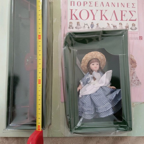 Porcelain doll with wooden seesaw miniature new