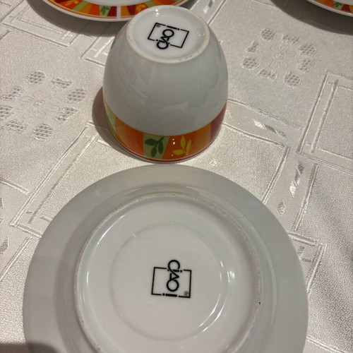 Vintage set of 6 cups and 6 saucers with bright colors, unused