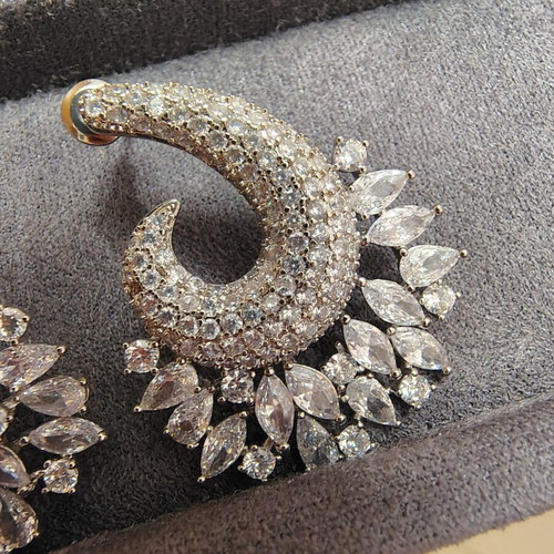 Earrings like new with zircon stones, silver color