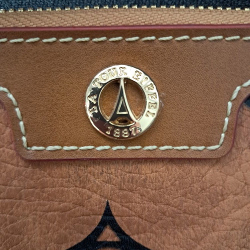 La Tour Eiffel crossbody bag like new, brown with gold details