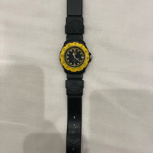 Tag Heuer F1 used watch in yellow and black with minor strap defect