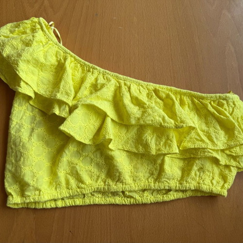 Zara yellow top used with ruffles and asymmetric neckline