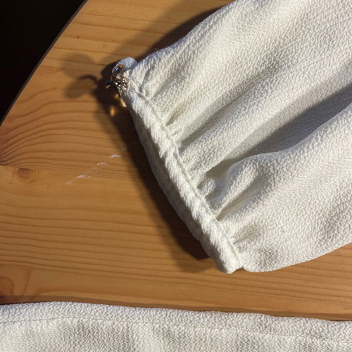 White blouse Made in Italy with ruffles and cuff buttons used