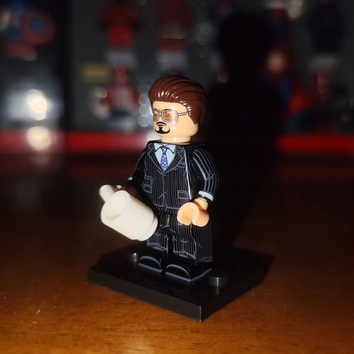 Tony Stark Iron Man Lego minifigure with stand and white cup