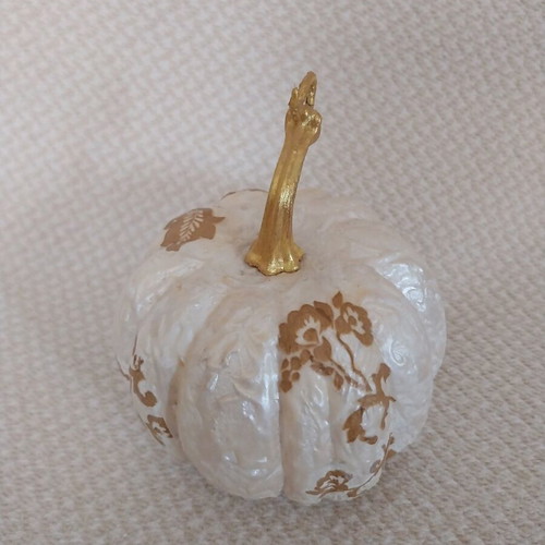 Handmade decorative pumpkin made of polystyrene with decoupage technique