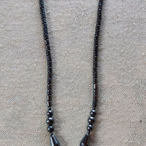 Hematite necklace like new with dolphin pendant