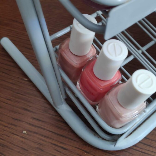 Orly metal tabletop stand with 36 slots for nail polishes used