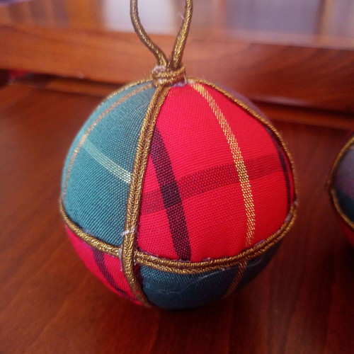 Set of handmade Christmas ornaments with three large plaid balls
