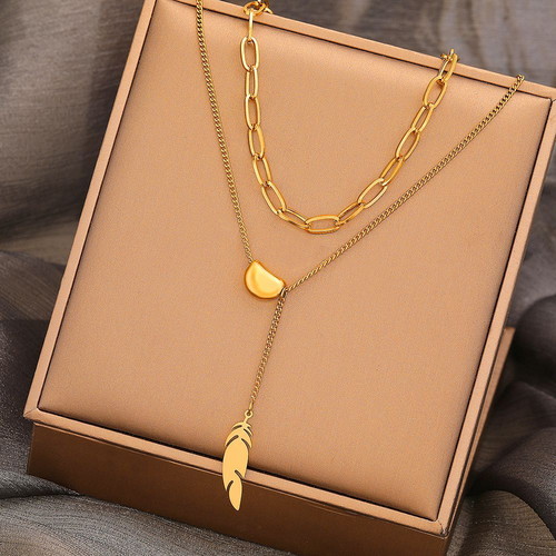 Feather necklace in gold color new stainless steel