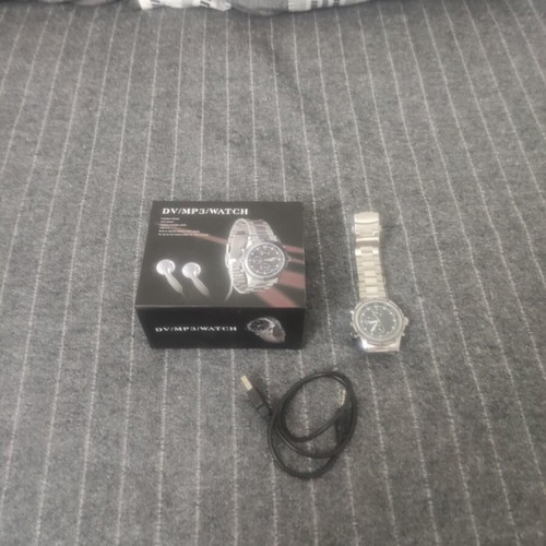 Watch with camera and mp3 used, battery needed