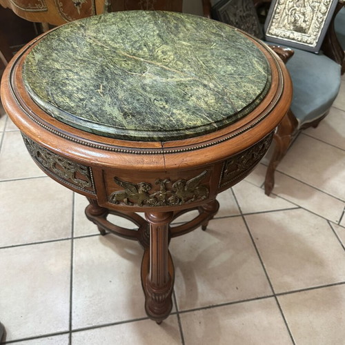 Table with bronze details and marble top used