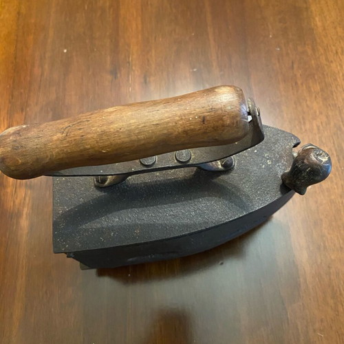 Antique charcoal iron used, cast iron with wooden handle