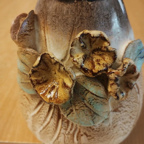Clay vase like new with embossed flowers 0.14 height