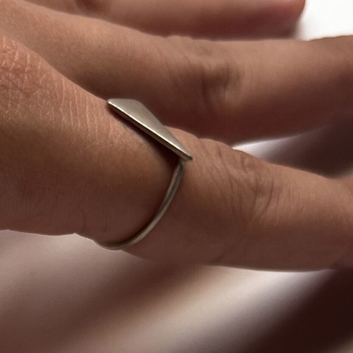 Triangular brass ring like new with thin band and textured finish