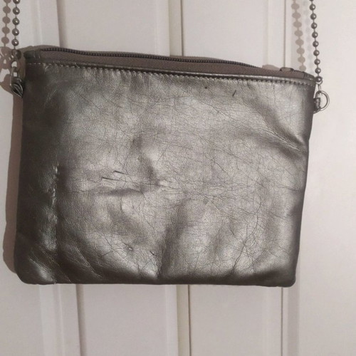 Material Girl crossbody bag used with sequins camouflage design