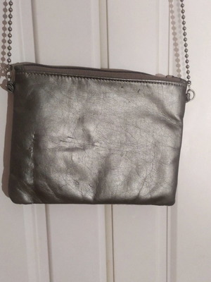 Material Girl crossbody bag used with sequins camouflage design