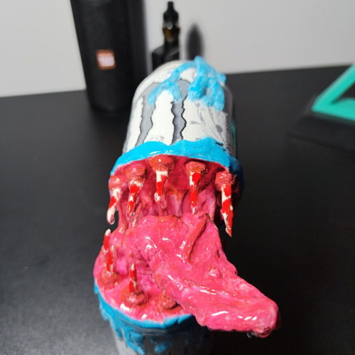 Handmade monster figure from Monster can with clay and UV resin